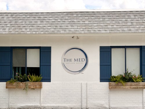 The Med Artisan Eatery sign